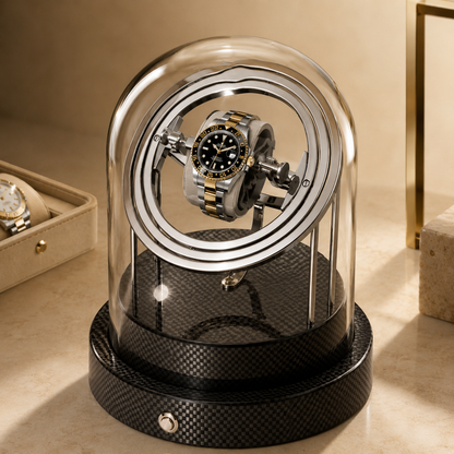 Remontoir gyroscopique noir carbone avec montre bicolore sous cloche