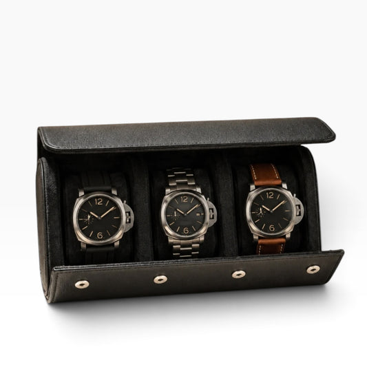 Étui à montre en cuir noir ouvert avec 3 montres