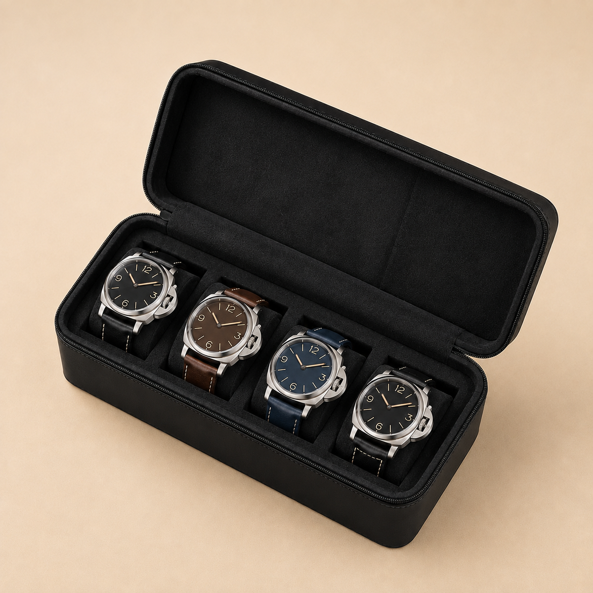 Étui à montres en cuir noir ouvert avec 4 montres