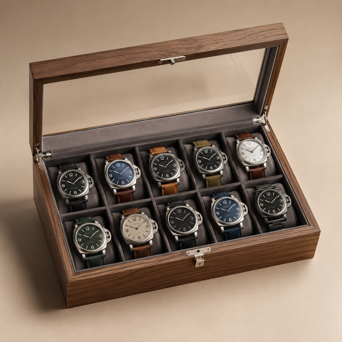 Boîte à montres en bois de noyer noir, ouverte avec 10 montres différentes, vue de dessus
