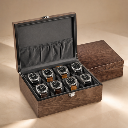 Boîte à montres en bois de noyer noir, ouverte avec 8 montres, intérieur noir avec poche en tissu