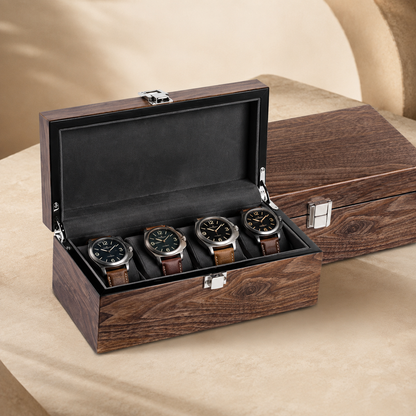 Boîte à montres en bois de noyer noir, ouverte avec 4 montres, autre angle
