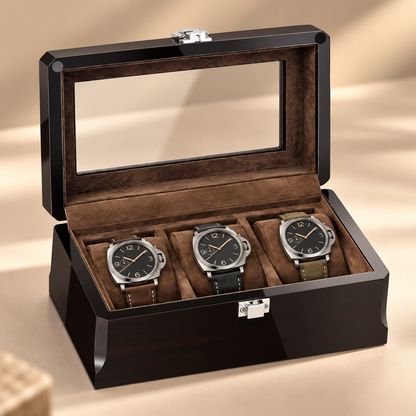 Boîte à montres en bois laqué ébène, ouverte avec 3 montres, en décor